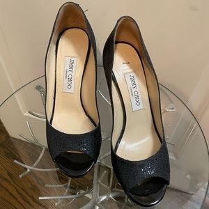 Jimmy Choo
Luna Black Glitter Fabric Peep Toe Platform Pumps